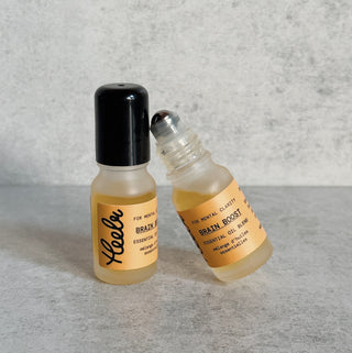Heelr's Brain Boost is a synergistic blend of essential oils designed to help you stay focused, sharp, and alert. It helps reduce cortisol levels and anxiety while improving memory recall, cognitive function, and mental clarity. This uplifting blend will help awaken your mental powers, giving you the intellectual brilliance you need to excel in any field.
